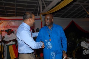Former President Bharrat Jagdeo congratulates flautist Keith Waithe on his musical performance in Guyana 2008