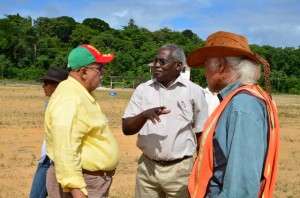 President Donald Ramotar, Minister of Public Works Robeson Benn and Technical Adviser Walter Willis in discussion during an inspection of the road under construction to the Amaila Falls