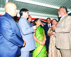 Indian High Commissioner to Guyana Puran Mal Meena (second left) and his wife (in green); Deputy High Commissioner Therat Singh (left); Prime Minister Samuel Hinds and Mrs Hinds (from right) and Agriculture Minister Dr Leslie Ramsammy during the reception to observe the 64th anniversary of the Republic of India