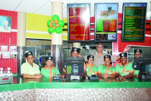 Jad Rahaman and staff at the new JR Burgers location