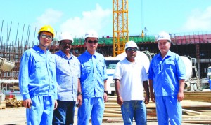 Flashback: Officials of the Shanghai Construction Group along with their Guyanese counterparts after a brief tour of the construction site