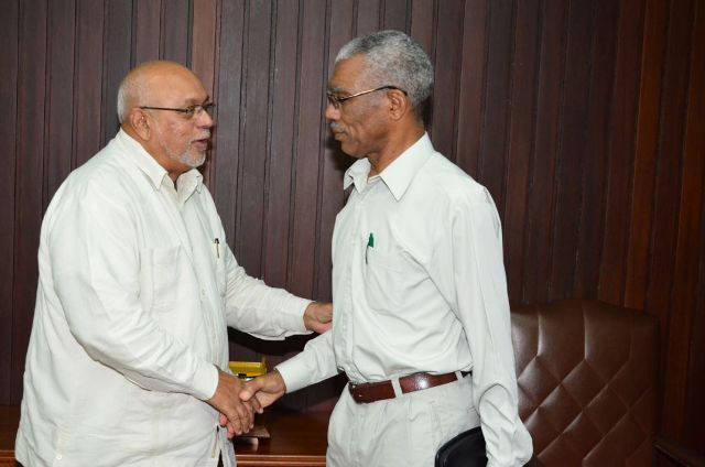 President Donald Ramotar and Opposition Leader David Granger greet each other at the Office of the President on January 15, for talks