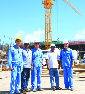 Officials of the Shanghai Construction Group along with their Guyanese counterparts after a brief tour of the construction site