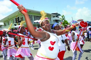 Young revellers parading the streets of Georgetown on Saturday