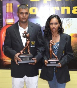 Guyanese Avinash Persaud and Christine Sukhram, male and female winners of the 2012 Guyana Open