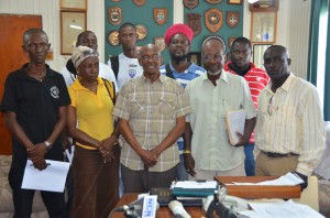 Georgetown Mayor Hamilton Green (centre) and chief organiser Lennox Arthur (second from right) pose with representatives of some of the participating teams at City Hall on Tuesday (Photo: Avenash Ramzan)