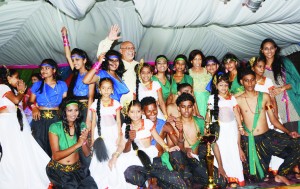 Members of the Gewan Kanitya Dance Troupe with President Donald Ramotar at the event on Saturday evening