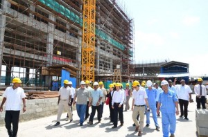 President Donald Ramotar touring the Marriott hotel construction site at Kingston in the company of a team that included Chinese Ambassador to Guyana Zhang Limin and the Shanghai Construction Group