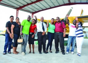 The four couples with Captain Larie Barclay after their tour