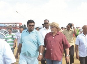 President Donald Ramotar and acting Tourism Minister Irfaan Ali at the Number 63 Beach, Berbice 