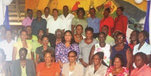 Education Minister Priya Manickchand is joined by the long-serving Guyanese CXC local registrar, examiners, and staff of the exams division