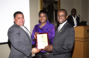 Receiving an award for her writing skills in St Maarten