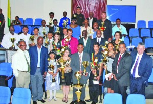 Dr Frank Anthony (second right); Director of Sport Neil Kumar (left); Permanent Secretary within the Sport Ministry, Alfred King (second left) pose with awardees and other officials after the award ceremony (Photo: Carl Croker) 