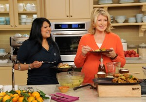 Cooking with fellow culinary expert Martha Stewart (right)