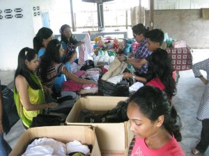 Distributing clothing and toys during a charity drive