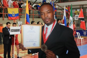 Carwyn Holland posing with his certificate