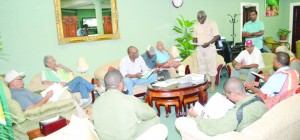 Public Works Minister Robeson Benn briefing the opposition parliamentarians abacout the Amaila Falls Project at the Cheddi Jagan International Airport prior to them travelling to the site