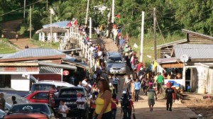 Tourists crossing the Kumaka bridge, Moruca, to join in the expo celebrations