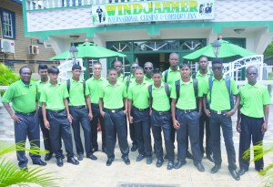 Guyana’s 14-man squad along with manager David Black and coach Adrian Amsterdam prior to their departure  from the Windjammer hotel in Kitty on Wednesday  (Rajiv Bisnauth photo)