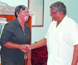 Jamaican representative on the network, Shirley Pryce meets Labour Minister Dr Nanda K Gopaul