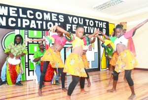 Dancers perform to the energetic vibrations provided by the African drummers as the African Cultural and Development Association (ACDA) launches the 175th Emancipation anniversary celebrations at its headquarters, Thomas Lands on Wednesday (Carl Croker photo)