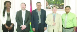 Natural Resources and Environment Ministry Technical Officer (Environment) Ndibi Schwiers; U.S. Embassy Economic and Commercial Officer Jeffrey S Barrus; Natural Resources and Environment Minister Robert Persaud; U.S. Environmental Representative Alain Norman; and Natural Resources and Environment Ministry Policy Planning and Coordination Unit head Veetal Rajkumar 