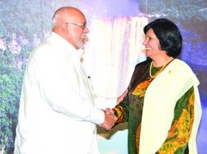 President Donald Ramotar shakes hands with new Malaysian High Commissioner to Guyana Dato Sudha Devi Vasudaven