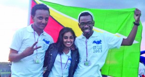 Guyana’s representative Umadevi Bux, flanked by Ethiopia's Youth Ambassador Simon Alebachew (right) and Barbados' Youth Ambassador Jamonn Roberts (left) 