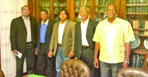 Alleged defectors from the AFC: from left to right: Rab Mukraj, Dr Asquith Rose and Tarron Khemraj with APNU leader David Granger and shadow public works minister Joseph Harmon at the meeting in New York