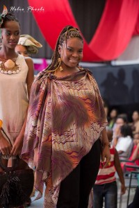 Designer Carol Fraser modelling one of her designs on the catwalk in Suriname