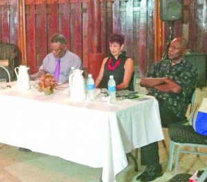 Left to right Prime Minister Samuel Hinds, Professor Jane Byrce and Al Creighton at the headtable 