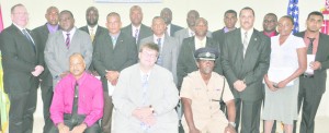 Graduates of the course pose with U.S. officials and Crime Chief Seelall Persaud