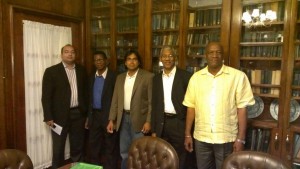 APNU Chairman David Granger (fourth left) and executive Joseph Harmon (right) with the three AFC defectors: Rab Mukraj (left), Dr Asquith Rose and Tarron Khemraj