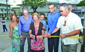 Surinamese businessman Karel Dawson and his wife, Jane (left), along with Natural Resources Minister Robert Persaud, local businessman Captain Gerry Gouveia and other attendees, at the ceremonial ribbon-cutting to open HFD Mining Supplies on Sunday