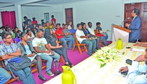 Attorney General Anil Nandlall addressing a section of the audience at the PYO Night of Reflection held at Red House, Kingston, Georgetown 