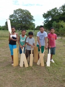 From left are Cheryl Hernandez, Waidan Hernandez,  Ezekile Hernandez, Theodore Alexander and Leandra Ny-A-Fook with their self-made cricket bats and wickets) 