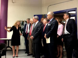 Leslie Cornfeld, Mayor Bloomberg’s chief policy advisor on truancy, shows the mayor, Commissioner Ray Kelly, Chancellor Dennis Walcott and others the room that will be used as the Truancy Center at West Harlem’s Police Athletic League. 