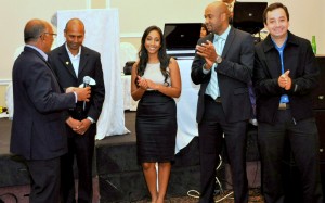 From left: TCCF’s treasurer Harry Bridgemohan, president Jay Brijpaul along with Vanita Ganesh, Andrew Hilton and Javier Cedano, all of The BrijTeam making a contribution of $10,000 to TCCF