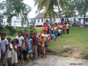 Children waiting to collect their toys