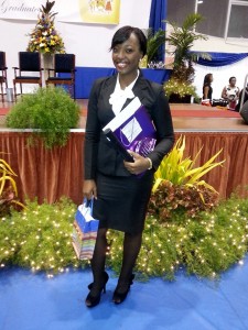 Holding prizes at her recent graduation from Hugh Wooding Law School