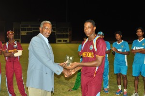 Preston McSween collects the Man-of-the-Match trophy