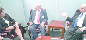 President Donald Ramotar and Foreign Affairs Minister Carolyn Rodrigues-Birkett engage OAS Secretary General José Miguel Insulza in discussion during their meeting 