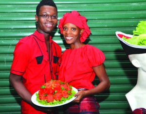 Designer Nelsion Nurse and a participant during the culinary competition