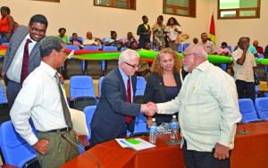 President Donald Ramotar greets IDB Chief of Division, Capital Markets and Finance, Juan Antonio Ketterer at  the launch of the Micro and Small Enterprise (MSE) project. Also in photo are IDB representative in Guyana  Sophie Makonnen, GBTI CEO John Tracey and acting Tourism Minister Irfaan Ali  (Carl Croker photo) 