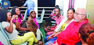 President Donald Ramotar interacts with passengers on the MV Sabanto on his way back to Georgetown after speaking at a PPP/C rally in Essequibo on Saturday.  This was the president’s first trip with the  roll-on/roll-off ferry. (GINA photo)