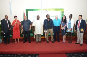 The 2012 Guyana Prize for Literature poetry category winner Cassia Alphonso, (third from right) who shares the category prize with Ian Mc Donald, poses with (l –r) Al Creighton, secretary of the Guyana Prize for Literature; Professor Jane Bryce chairman of the panel of judges; President Donald Ramotar; University of Guyana VC Professor Jacob Opadeyi, and other prize winners Ruel Johnson, Ian Mc Donald, Mosa Mathifa Telford and Chaitram Singh.