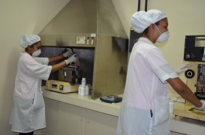 Samantha Roopnarine (left) and Sariyaana Kumar-Singh (right) working on the production of Flumavir