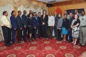 Speakers of the Suriname and Guyana Parliaments Dr Jennifer Geerlings-Simons (centre) and Raphael Trotman, along with other officials from both countries, including Prime Minister Samuel Hinds (to Dr Geerlings-Simons’ left); Sherlock Isaacs; Gail Teixeira and Indra Chandrapal pose for a picture following a luncheon at the New Thriving Restaurant (Carl Croker photo)