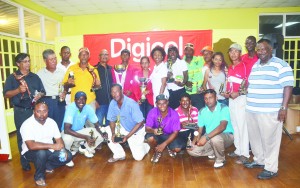 The top performers pose with Digicel officials (Photos: Avenash Ramzan)