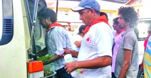 Members of the Sai Organisation of Guyana serving the needy in Georgetown 